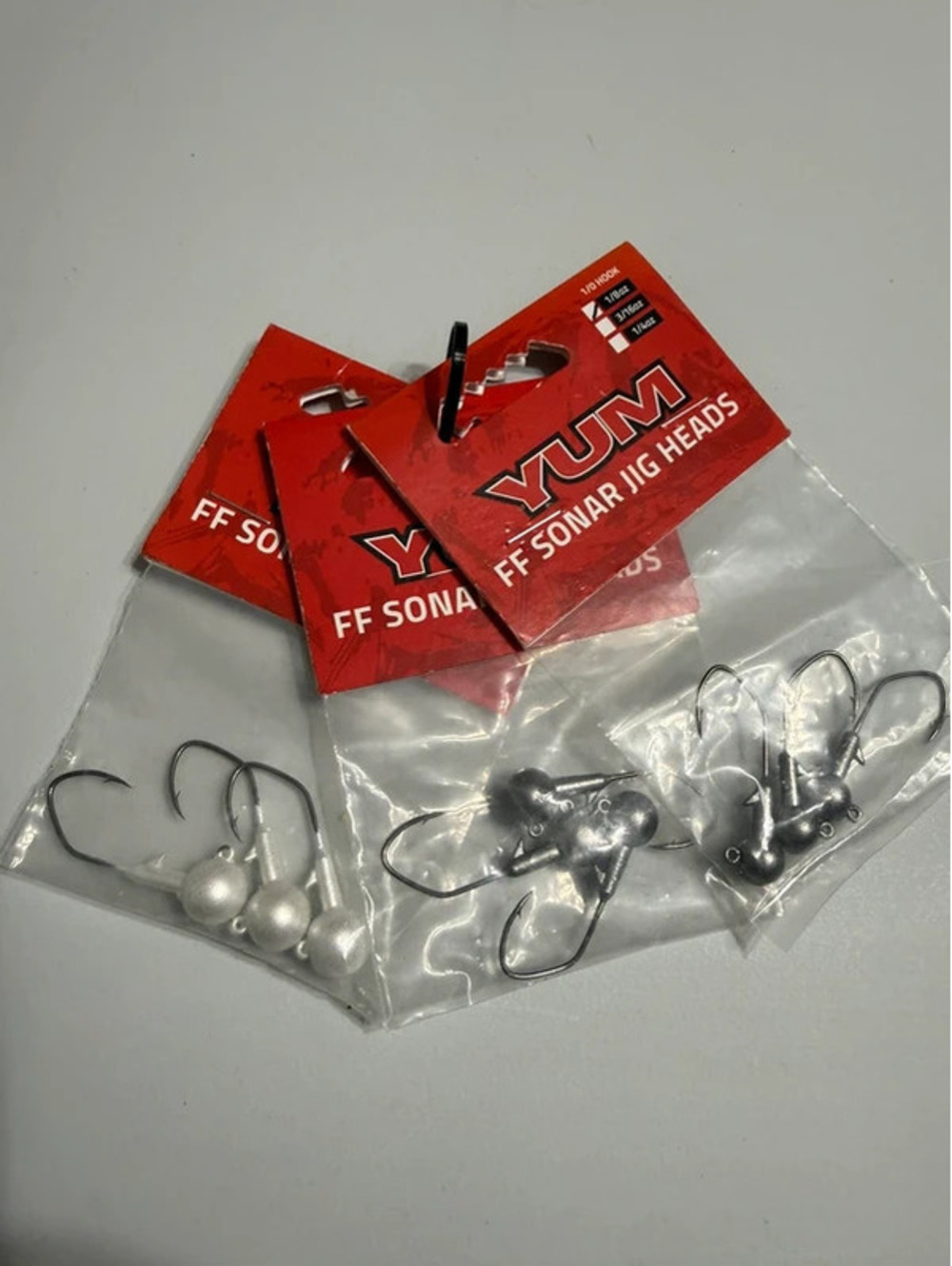 Fishing YUM FF Sonar Jig Heads Variety Pack - 1/4 oz Pearl, 1/8 oz Smoke, 3/16oz